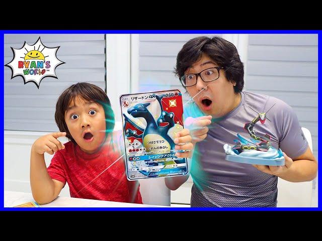 Ryan and Daddy opening Giant Size Pokemon Cards!!!