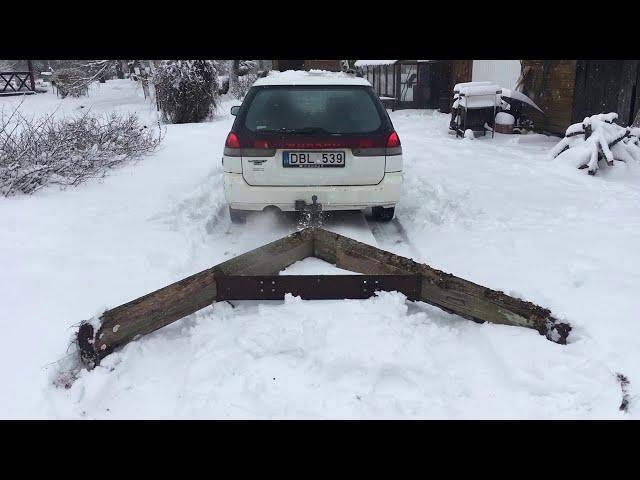 Scenic Snowy Drive in Lithuania forest. Snow blower test