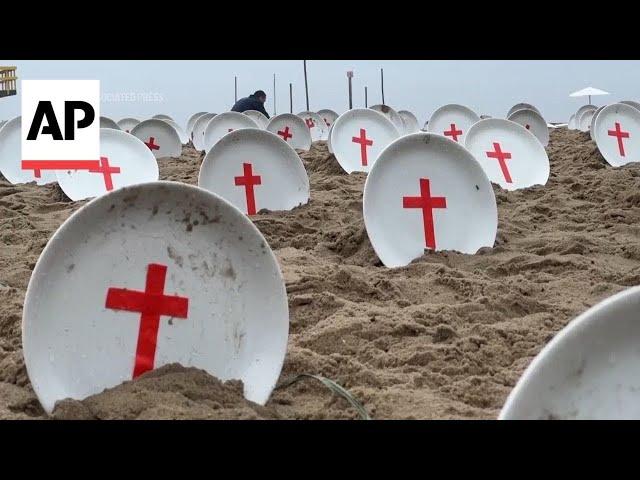 Empty plates on Copacabana beach in Rio highlight plight of world's hungry