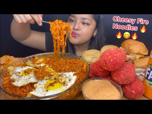 CHEESY SAMYANG FIRE NOODLES WITH RICE CAKES  CHEETOS CHICKEN DRUMSTICKS AND CHICKEN BURGERS & EGGS