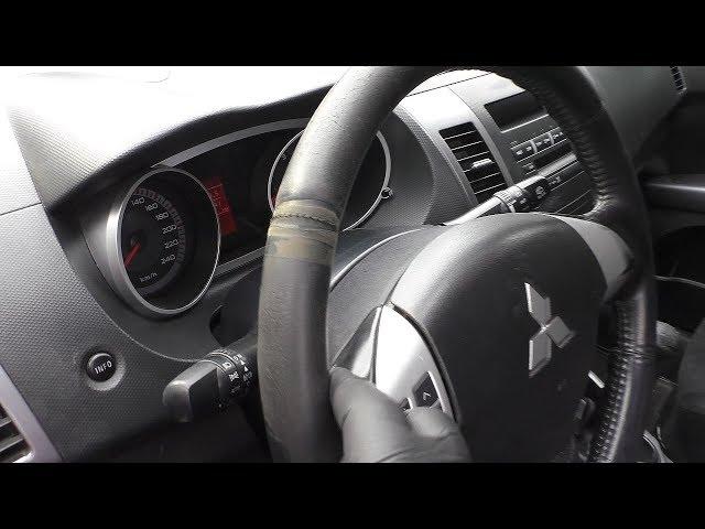 Mitsubishi Outlander XL - Перетяжка руля и ручки КПП кожей. -