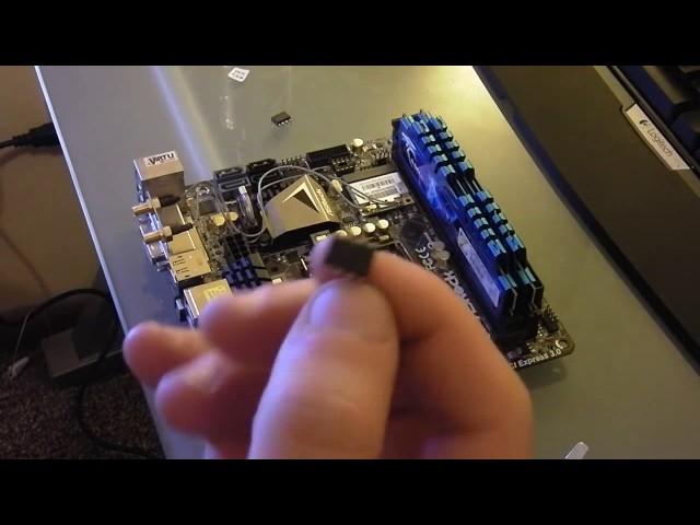 Replace the BIOS chip in a computer motherboard