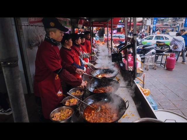 Delicious street food market in Guiyang, China: tons of traditional Chinese snacks. Worth the trip