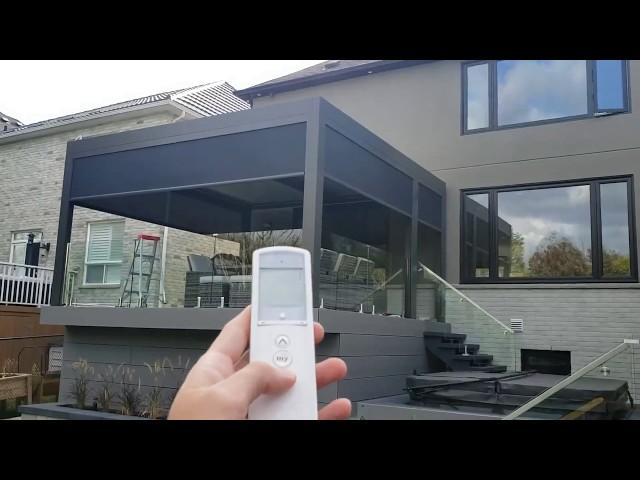 Aluminum Pergola attached to the house with the zip screens