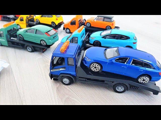 Burago tow truck of various colors 8 pieces