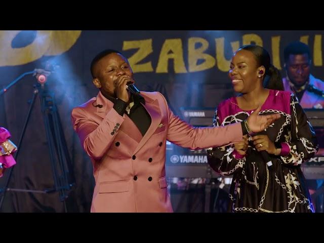 Agape Gospel Band ft Sarah Ndosi - Amenishangaza ( Official Music Video )