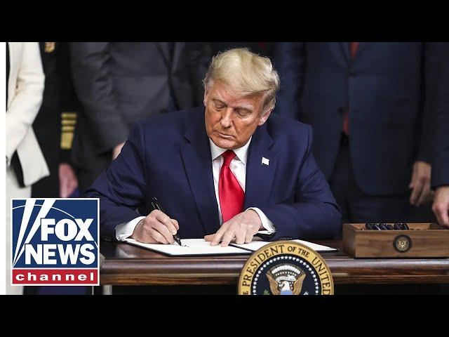 Trump signs executive orders from Oval Office