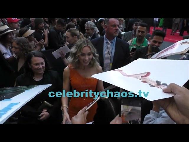 Emily Blunt rewards fans with autographs while promoting new movie