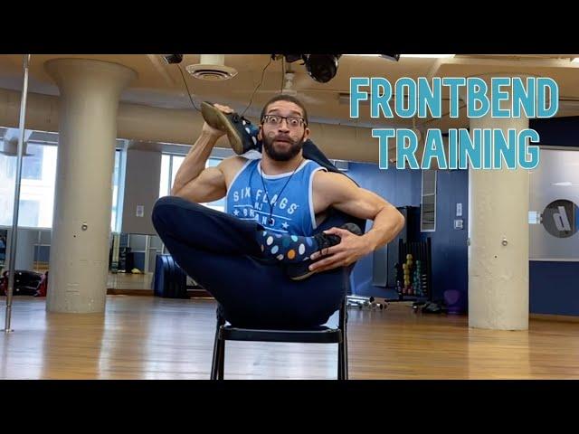 Frontbend training. Foot behind head. Male contortionist