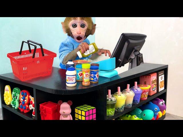 Monkey Baby Bon Bon pretend to be a cashier in a supermarket and eats watermelon with puppy