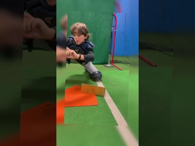 Catchers working on receiving angles! Dominate the bottom of the strike zone! #catchertraining