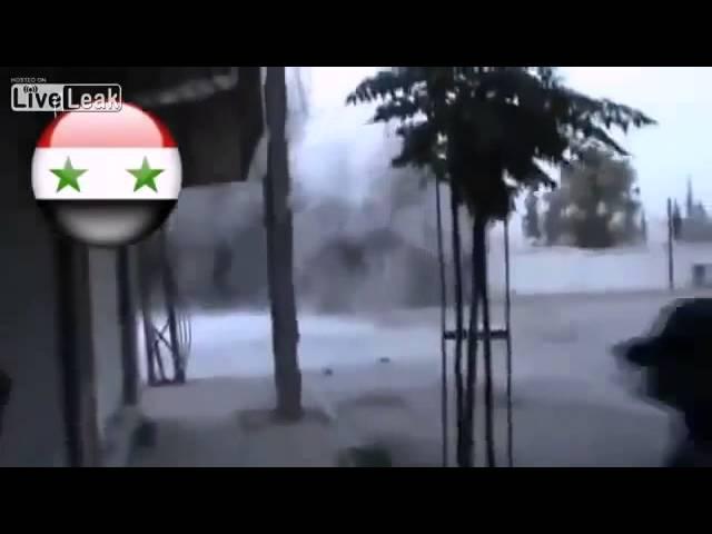 Syrian Arab Army - Artillery shell hits terrorists directly.