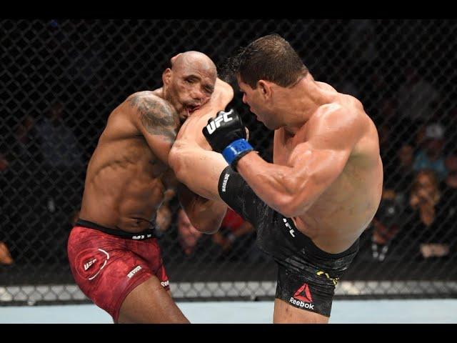 Yoel Romero eating headkicks