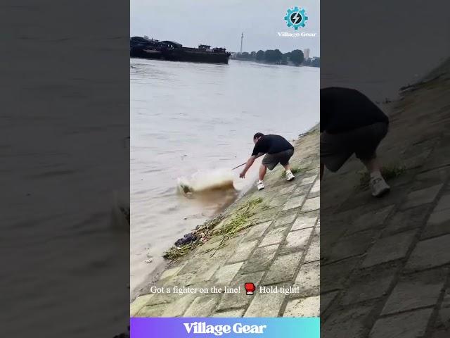 Dude Caught a Fish... Then the Fish Caught HIM!  #fishinggonewild #failarmy #funnyvideos  #ouch