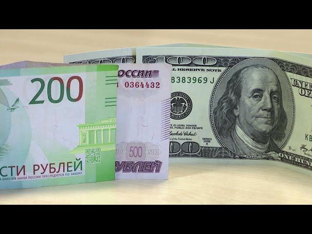 Russian rouble slides past 101 vs dollar