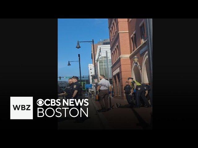 Man grabbed officer's gun near MGH and shot himself in foot, police say