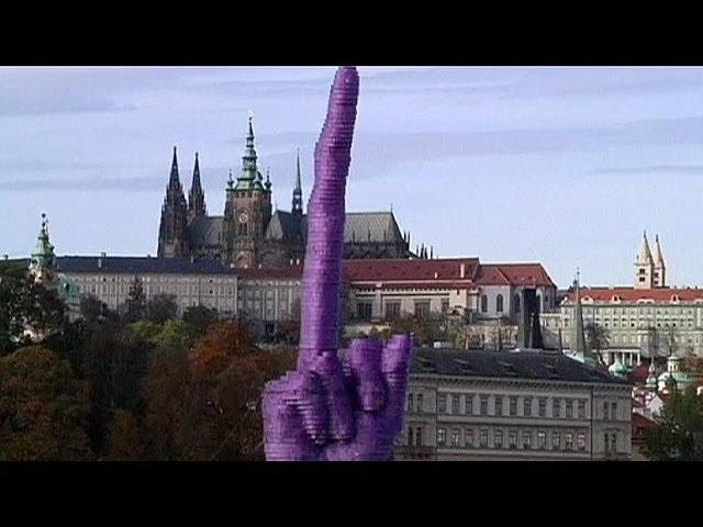 Czech artist's provocative floating finger salute to the President