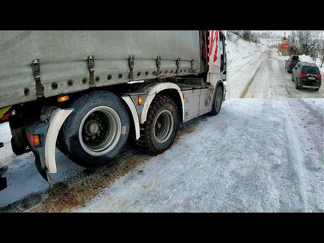 Driving in a column through a pass in Norway on chains!