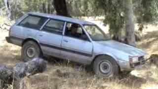 subaru with modified landcruiser rims in shallow crossing