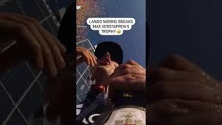 Lando Norris broke Max Verstappen’s trophy while doing his signature champagne opening 