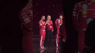 Lewis Hamilton receives an ovation from fans during the Ferrari presentation at the F175 lilve