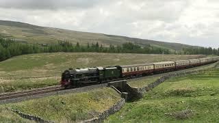 LMS Royal Scot #46100 is leading the S&C Fellsman excursion northbound at Ais Gill, UK