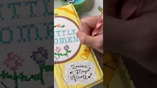 Ipainted a brick to look like “little women” by Louisa May Alcott, and added it to my garden library