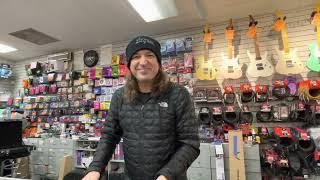 Michael Sweet of Stryper signs his Signature Sully Guitar at our Kingston MA Store, Music Unlimited