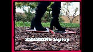 Crushing a Laptop with  Heels