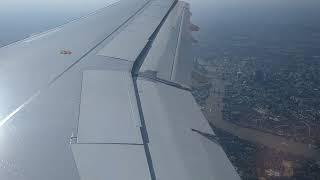 London under the wing of an airplane