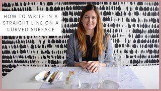 How to Write in a Straight Line on a Curved Surface