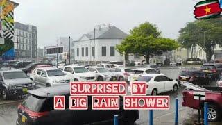 Suriname:surprised by a big rain shower Lim A Postraat