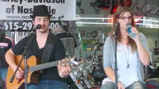 Jim Huish, Bryan Downing and Brittany Blaire playing the Bost Harley Davidson Showroom