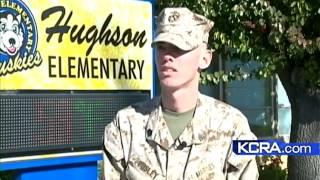 Hughson Marine stands watch over school
