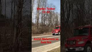 Dryden for a field fire assist to metamora