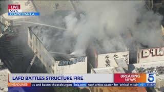 Homeless flee structure fire in downtown Los Angeles