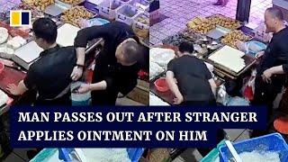 Man passes out after stranger in China applies mysterious ointment on his back