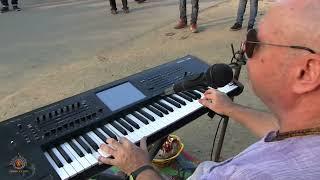 H.G.  Madan Mohan dasa performs kirtan for the guests in Mayapur