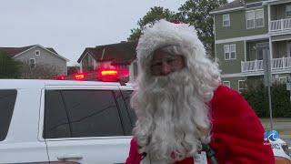 Santa talks to scared kids at emergencies