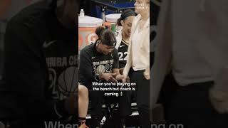 A'ja Wilson and Sydney Colson try to keep it down while turnin' UP on the bench 