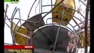 Kid dies falling from Ferris wheel.flv