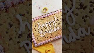 This giant chocolate chip cookie makes such a pretty birthday cake! Recipe at sugarandsparrow.com