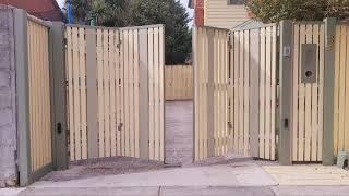 Beautiful Traditional Timber Bi-Fold Gates - by The Motorised Gate Company