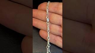 Silver chain making.