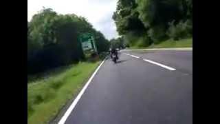 2 w650s riding together on board by pillion