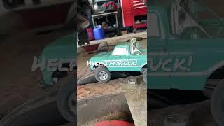 Tiny RC Truck Visits the Repair shop. Cats, Mustaches, and Hot Rods all inside this Cosmic Place