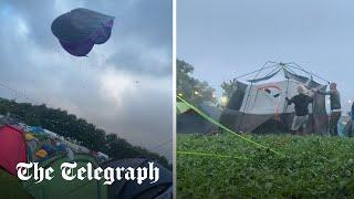 Festival tents fly through the air as Storm Lilian batters Britain