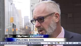 Video: Showdown brewing over police officer redeployment