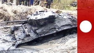 Rare WWII tank emerges from mud in Poland