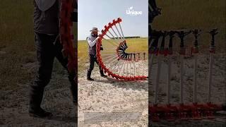 Spiral irrigation: people setting up a spiral irrigation system